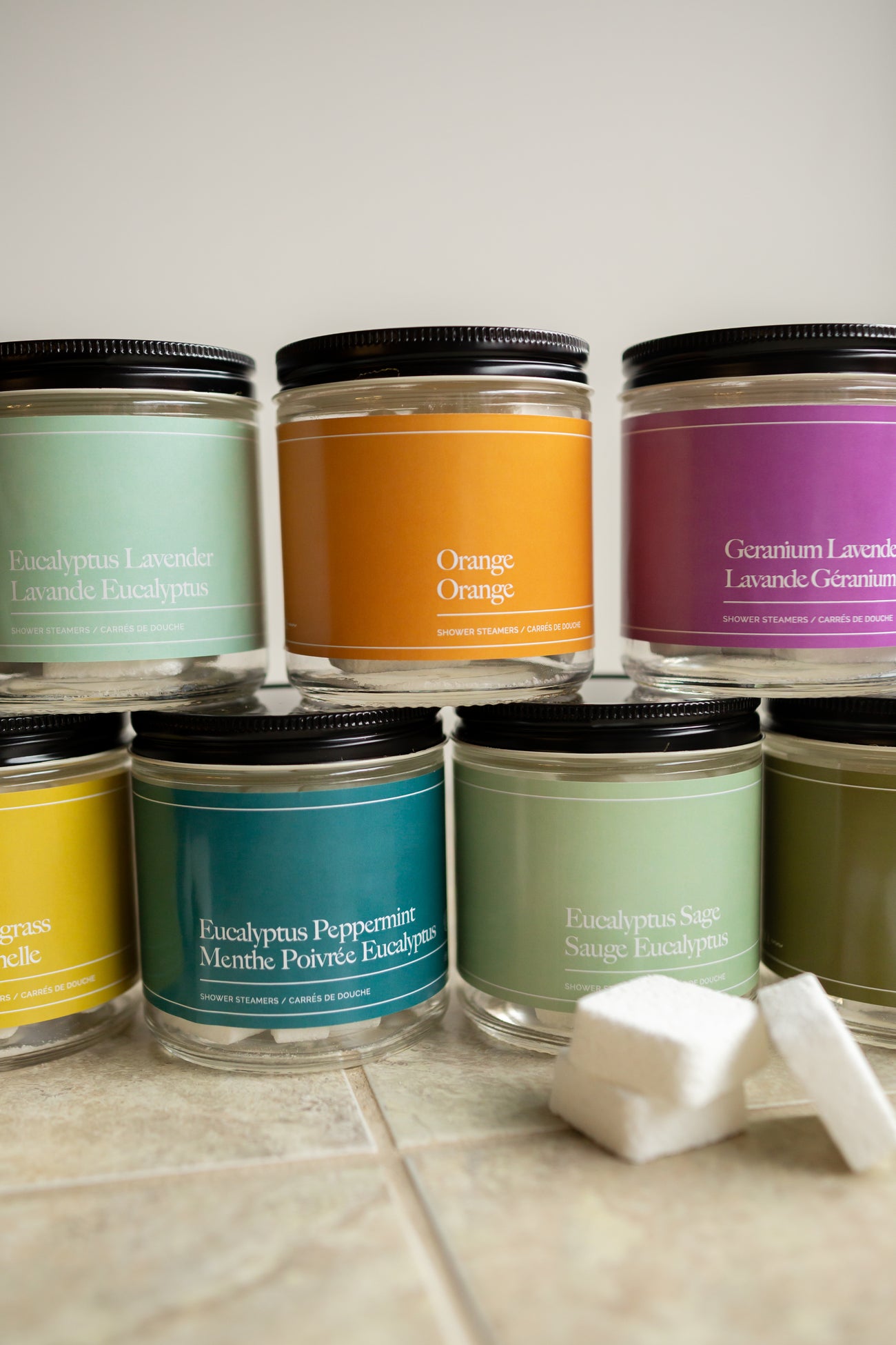 Colourful jars displaying packaging for showers steamers.